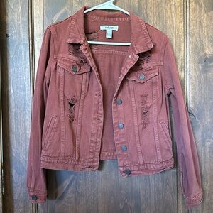 Distressed denim jacket